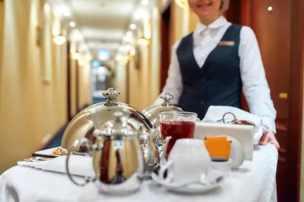 Room service tray in a hotel room.